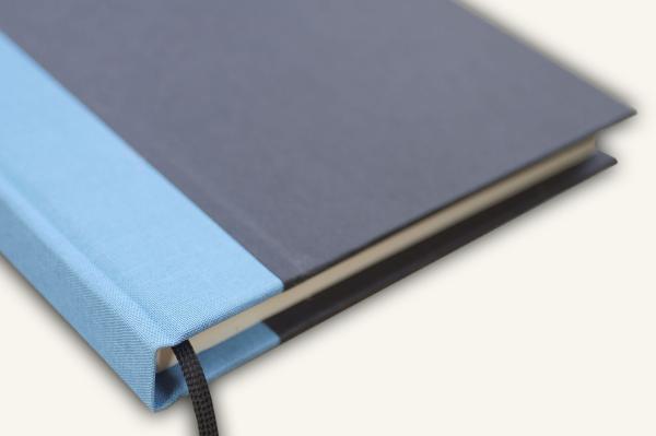 Writing and notebook black, with light blue linen